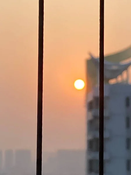 sunset over the window