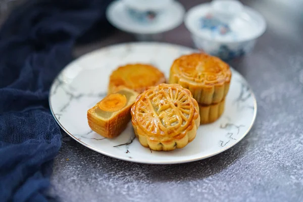 moon cake with yellow and white background