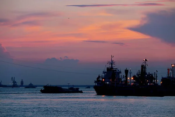 cargo ship at sunset, odessa, ukraine