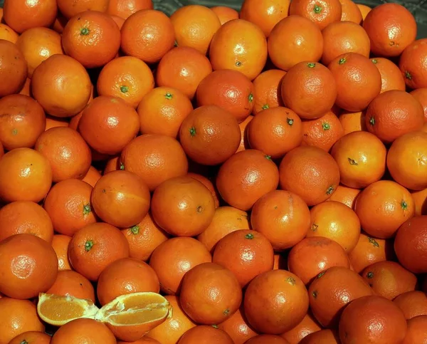 many oranges on a white background