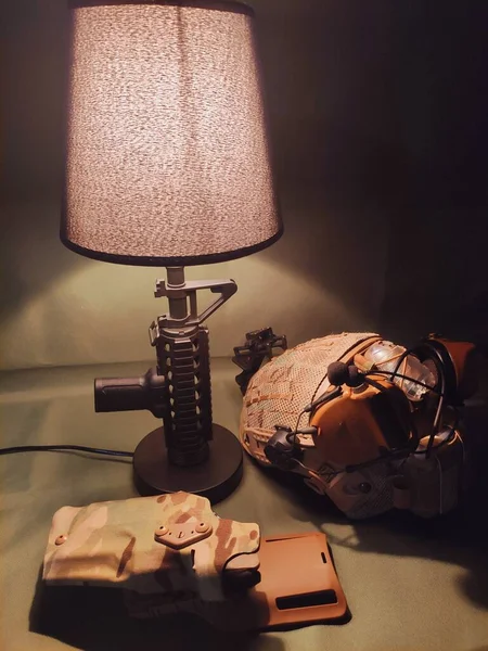 old vintage camera with a hat and a book on the table