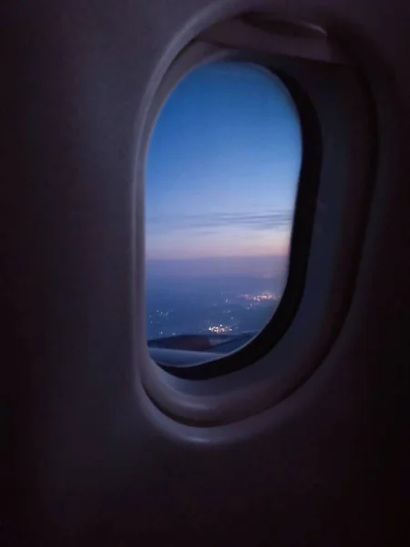 airplane window in the sky