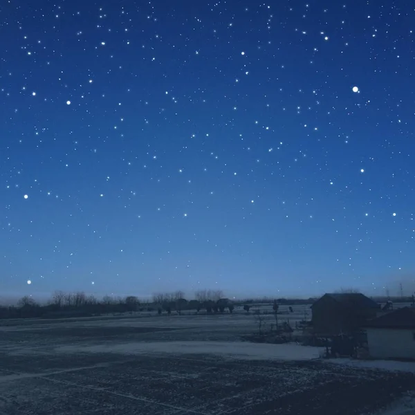 night sky with stars and snow