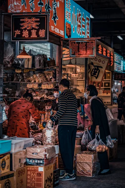 street market, hong kong-circa january, 2019: people in the streets of the city of barcelona