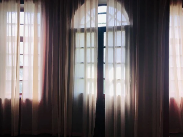 window with curtains and windows