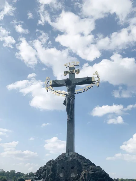 cross-shaped bell in the sky