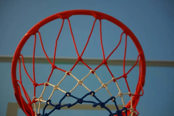 basketball hoop on a blue sky background