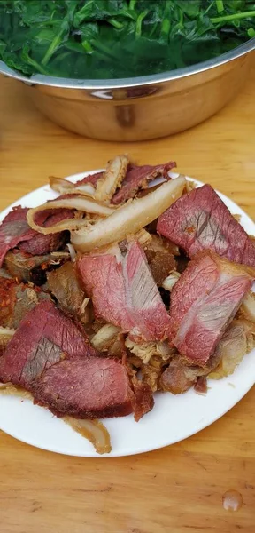 a cuisine photo of a dish of lamb