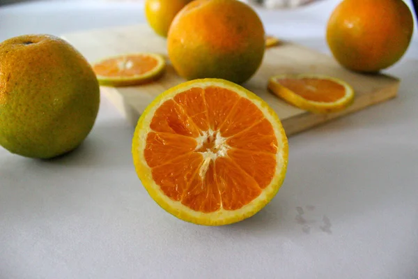 fresh orange and lemon on a white background
