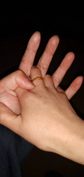 hand of a woman with a white background