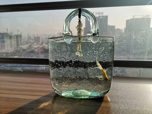 glass jar with water drops on the table