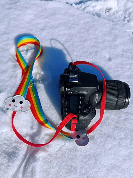 ski toy with a camera on a white background