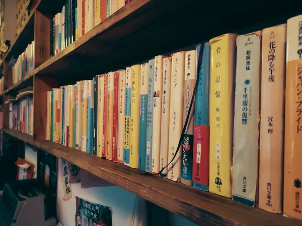 stock image library with books and letters of the bookshelf