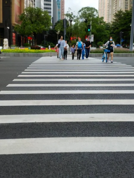 pedestrian crossing road in the city