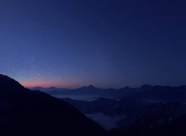 beautiful landscape with a mountain and a star