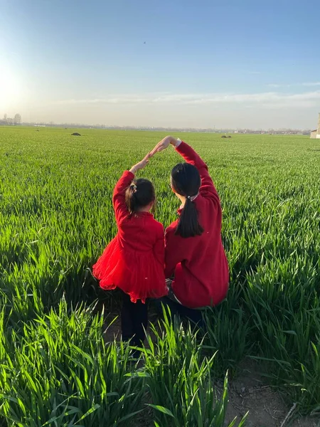 young couple in love on the field