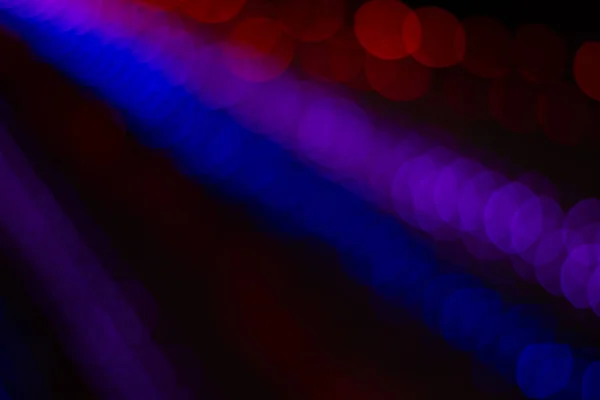 Abstracto Oscuro Bokeh Púrpura Rojo Rayos Luz Sobre Fondo Pantalla — Foto de Stock