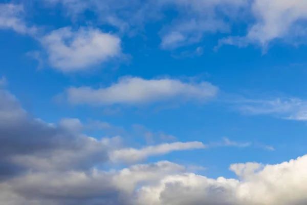 blue sky background with white and gray clouds simple nature view photography