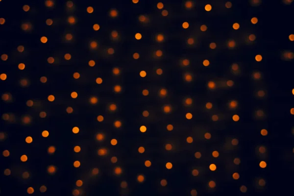 Svart Abstrakt Festlig Bakgrund Ofokuserad Orange Ljus Belysning Bokeh — Stockfoto
