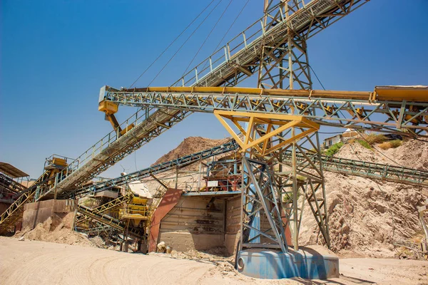 mine digging factory not working abandoned heavy equipment crane and machinery industrial objects in desert quarry