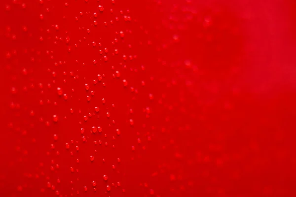 Stílusos háttér tapéta minta piros puha fókusz felület és víz csepp reklám motívum koncepció — Stock Fotó