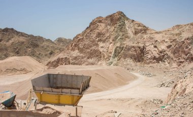 abandoned industrial object of digging factory in desert quarry nature space