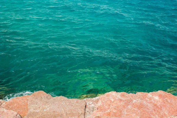 Ocean rocky coast line local scenic landscape photography from above, stone and blue water natural background pattern with empty copy space for text here — 스톡 사진