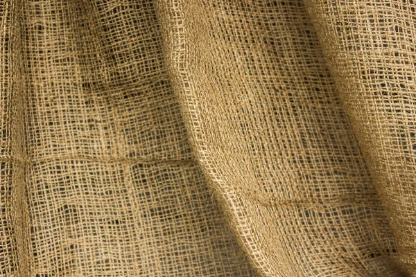 Rideaux bruns plis lumière intérieure et ombres fond de matériau textile — Photo