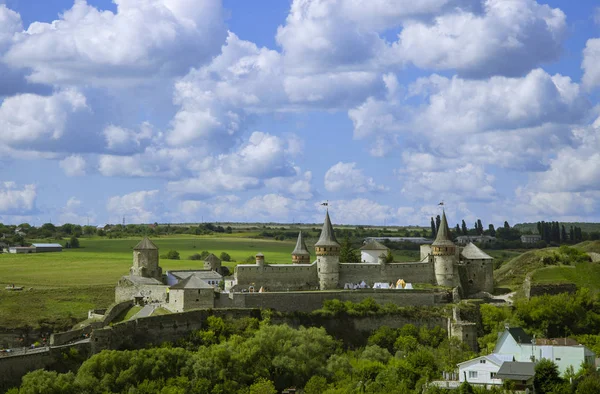 Castle architecture medieval building landmark touristic site scenic view summer time clear weather day with cloudy sky background hill land country side environment — 스톡 사진