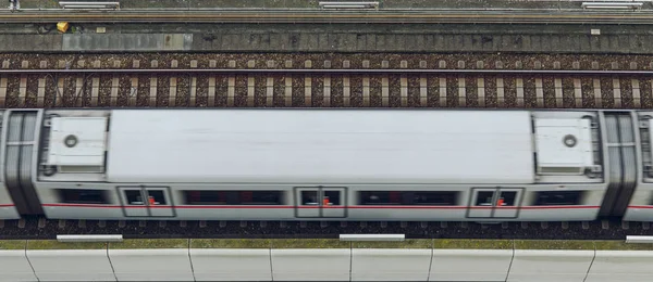 Vasúti pálya homályos mozgás vonat közlekedés felső nézet minta háttér városi kép geometria vonalak és formák — Stock Fotó