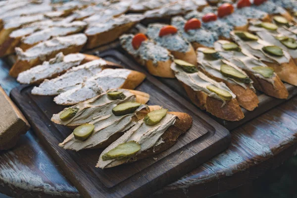 Rustic sandwiches with paste and vegetables on cafe tray soft focus food background photography close up concept — ストック写真