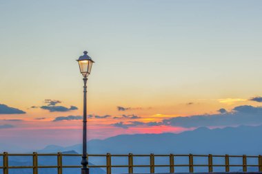 wallpaper nature atmospheric romantic shot view with outdoor street lantern light on evening sunset empty sky background, copy space
