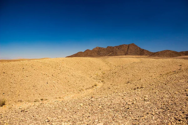 Global warming climate changes concept, landscape scenic view of desert dry ground soft focus foreground waste land environment — Stok fotoğraf