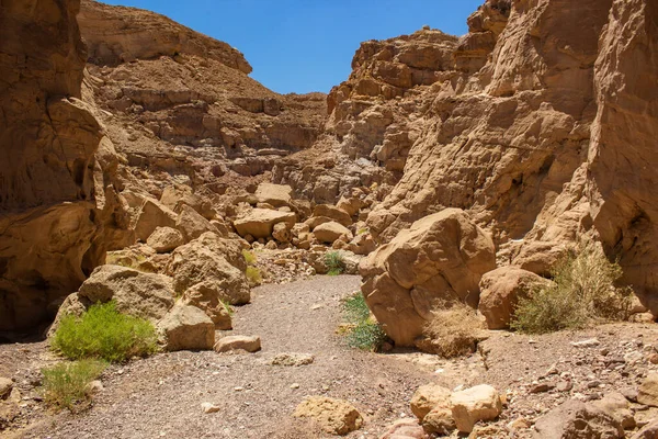 soft focus sand stone canyon passage between rocky mountains dry global warming scenic view concept in Israeli desert Negev place