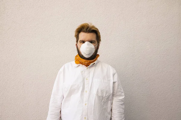 adult man in mask medicine respirator self protector object necessary in quarantine time neutral background wall space for copy or your text here