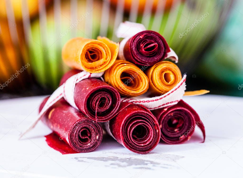 Delicious healthy fruit roll-ups made from raspberry, pumpkin and apples
