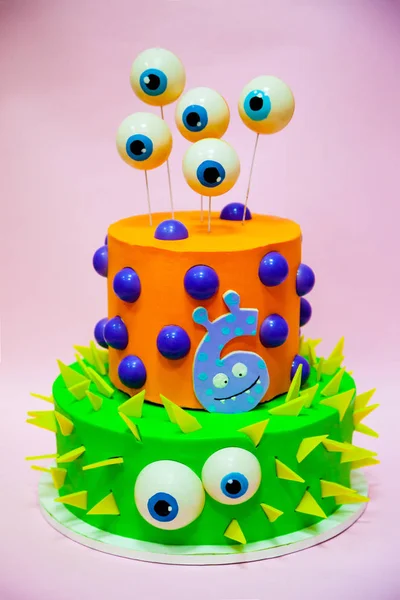 Creative monster kids two tiered cake — Stock Photo, Image