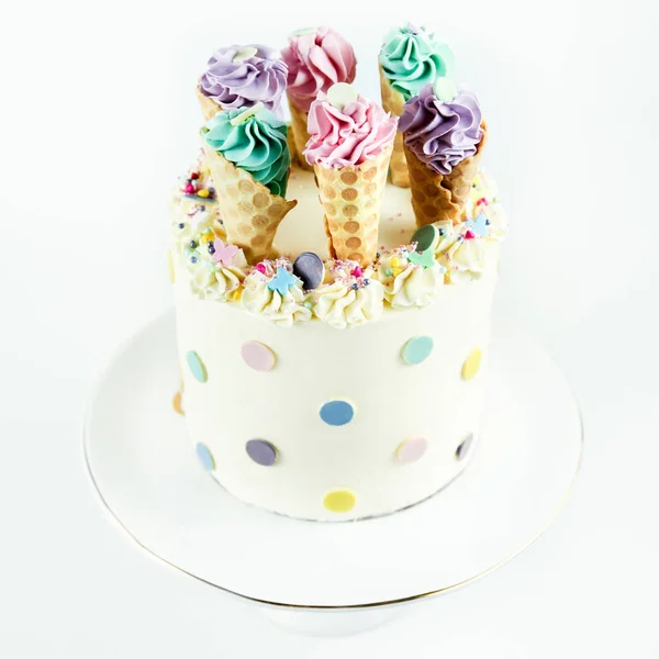 Birthday ice cream cone cake on a white background