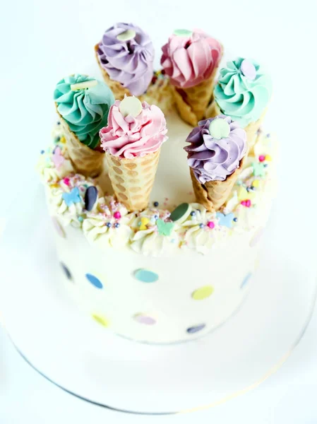 Birthday ice cream cone cake on a white background