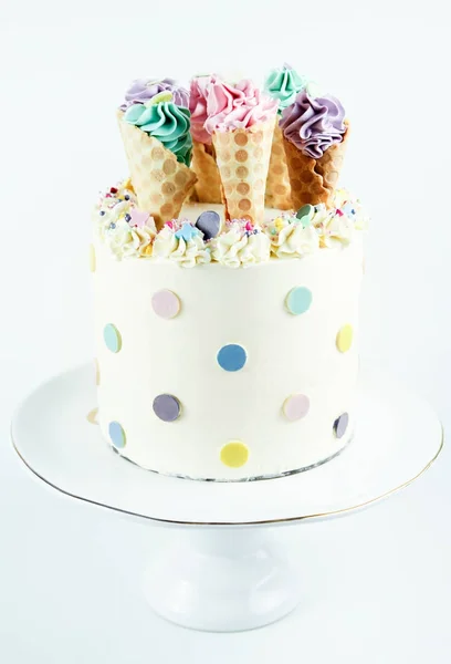 Birthday ice cream cone cake on a white background