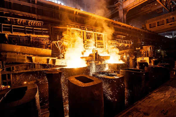 Liquid steel in the tanks — Stock Photo, Image