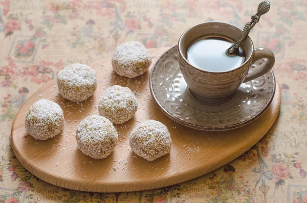 Truffles with dried mango dried apricots with peanut butter and — Stock Photo, Image