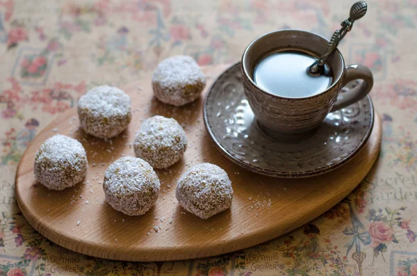 Truffles with dried mango dried apricots with peanut butter and — Stock Photo, Image