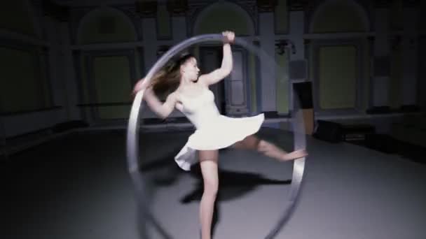 Circus artist training with a big hula hoop — Stock Video