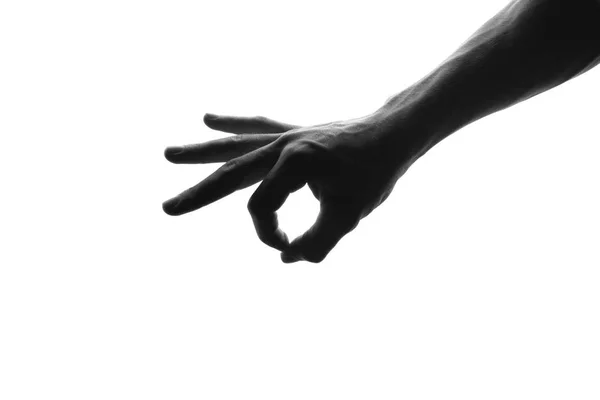 Silhouette of man's hand shows ok symbol - isolated on white — Stock Photo, Image