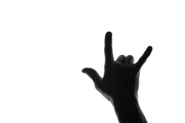 Silhouette della mano dell'uomo mostra il gesto rock - isolato su bianco — Foto Stock