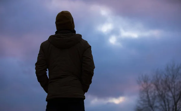 Thoughtful human silhouette looking at sky — Stock Photo, Image