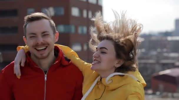 Happy joyful couple embracing each other on the roof — Stok video