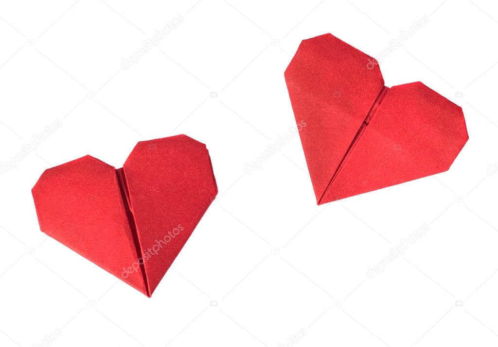 Two red origami hearts on white background. Isolated Valentines 