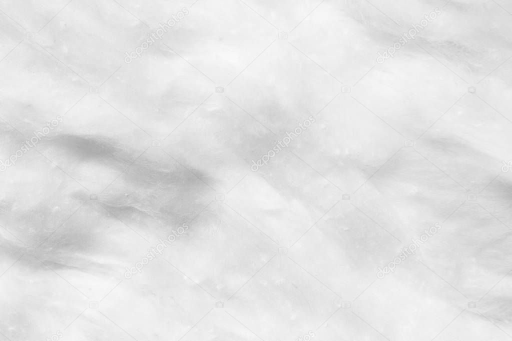 Medical cotton wool. White abstract background